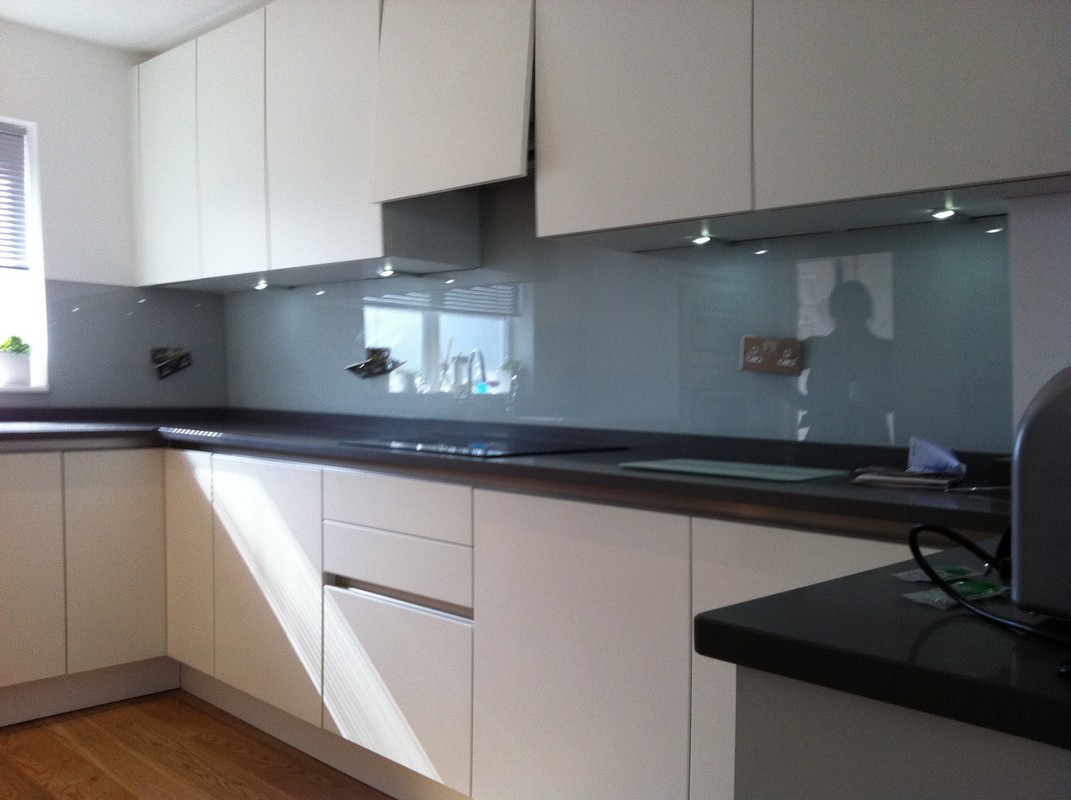 Grey glass kitchen splashback with LED lighting in Bicester