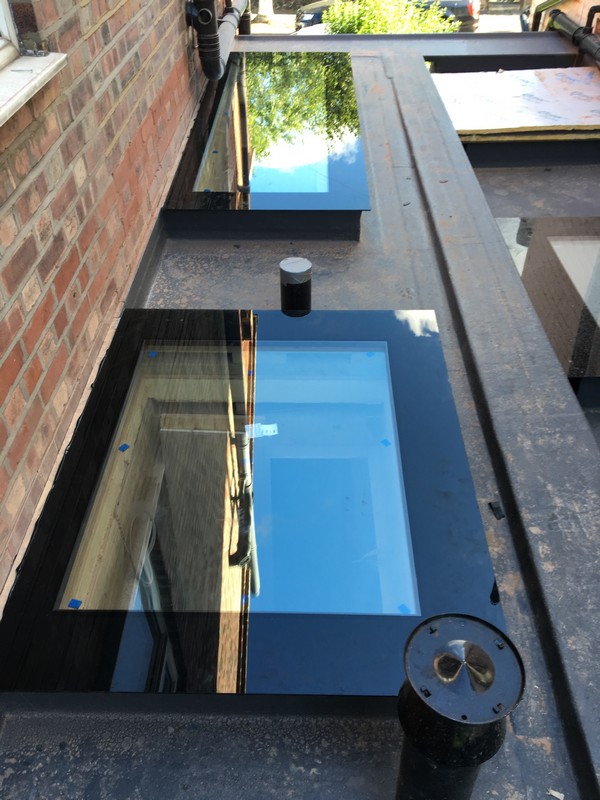 Multiple flat roof skylights on extension in Bicester